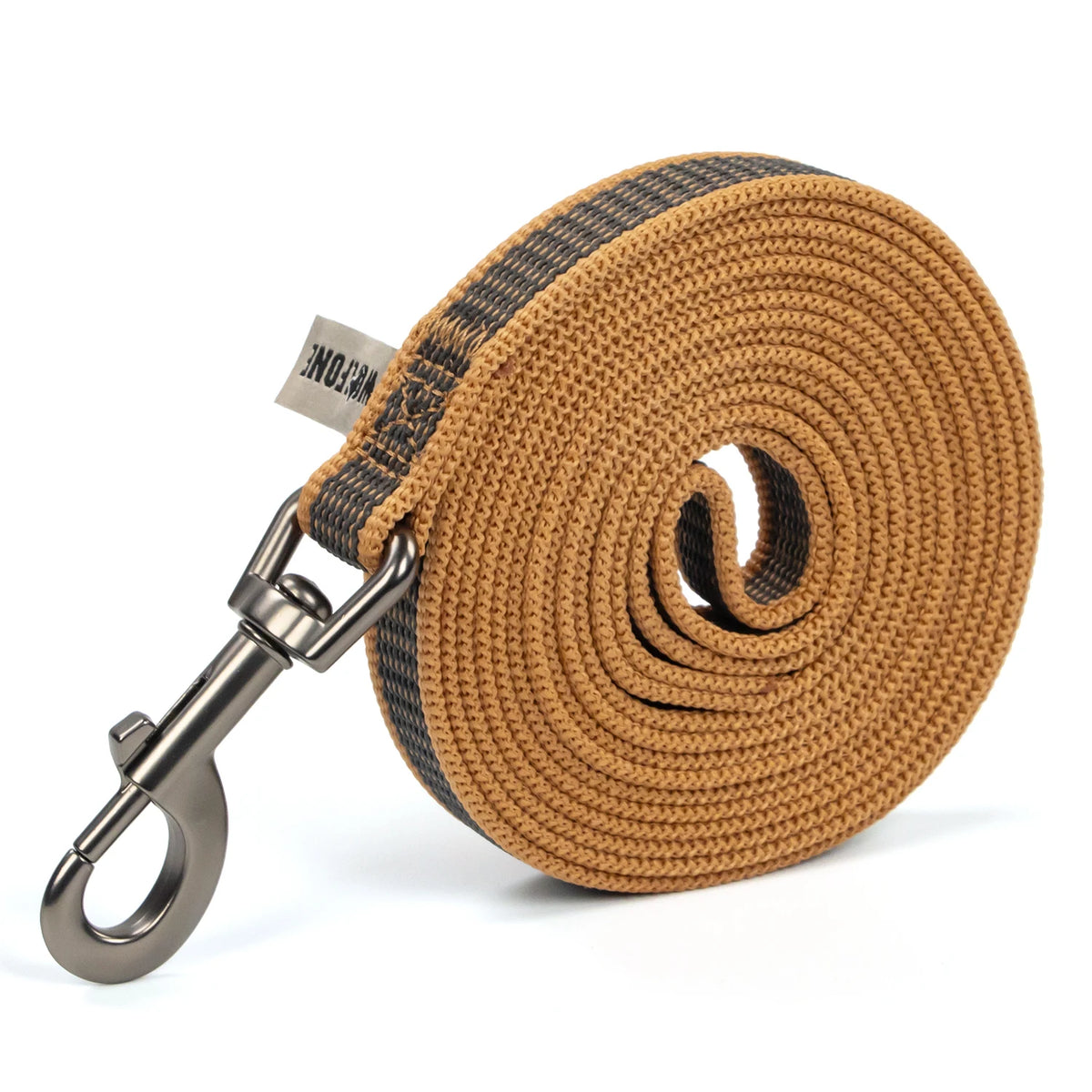 A roll of tan and black braided nylon dog leash with a metal clip attached.