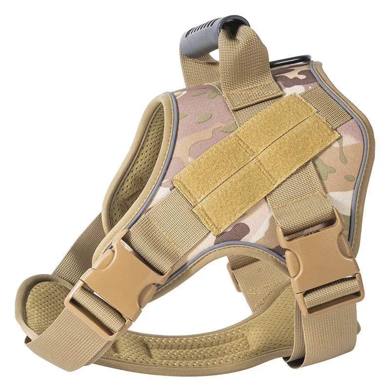 A heavy-duty tactical dog harness in tan and green camouflage fabric with a gray strap visible.