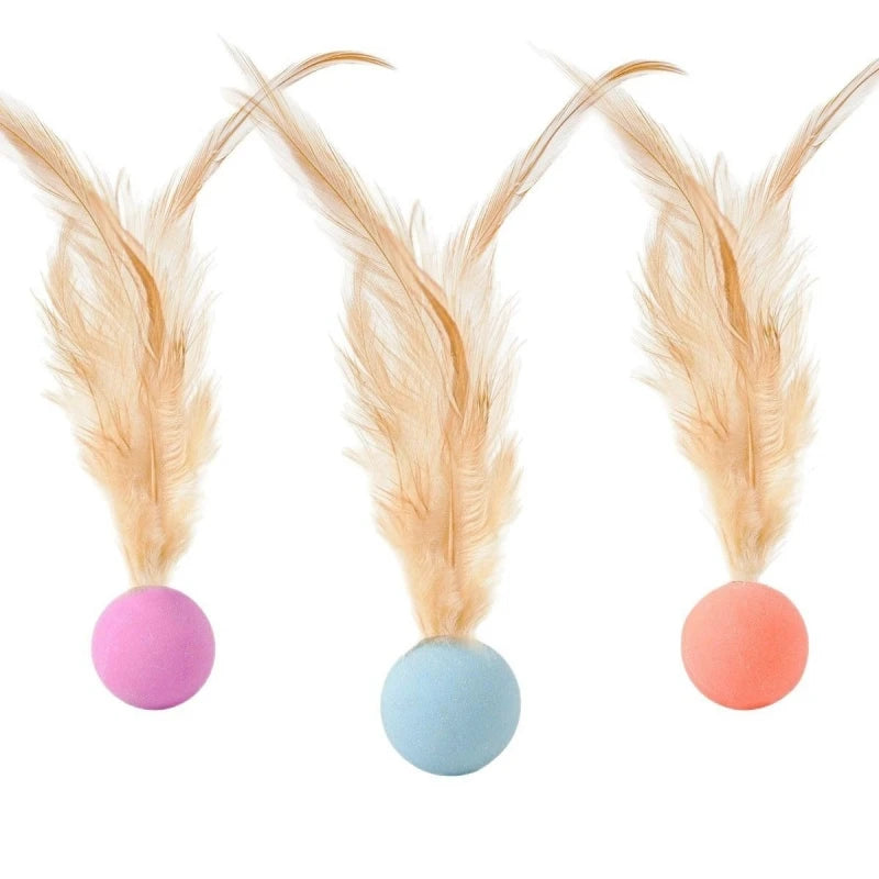 Five natural-colored feathers attached to elastic balls in pink, blue, and coral tones