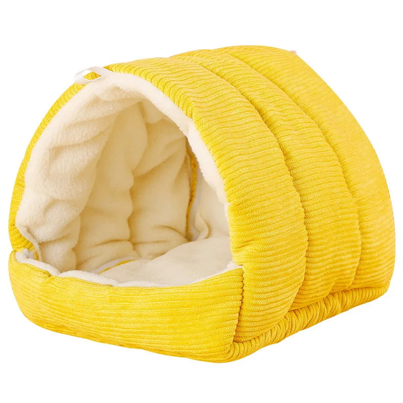A bright yellow, quilted cotton bird nest designed for winter comfort.
