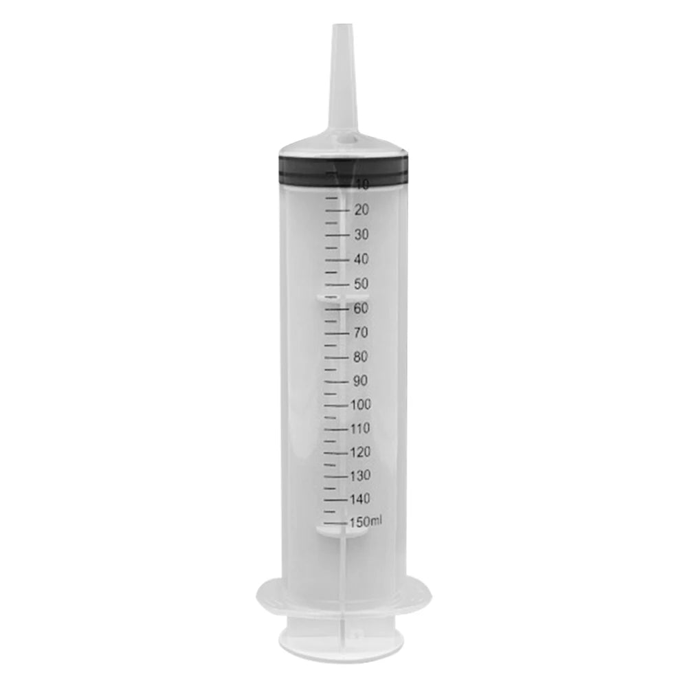 A clear syringe with a graduated scale marked in milliliters, used for BBQ marinade injection.