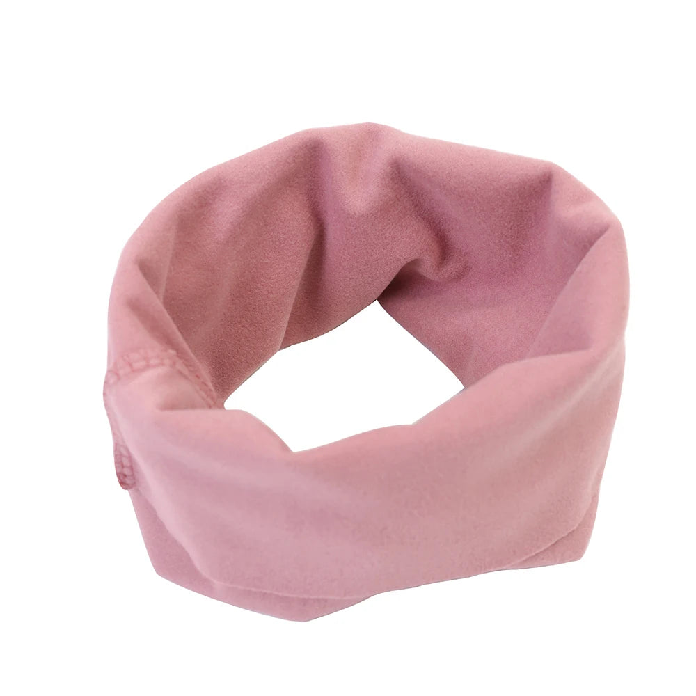 A soft pink dog earmuff hat designed for warm noise-shielding ear cover for small, medium, and large dogs.