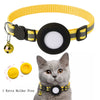A yellow nylon cat collar with a black circular holder and a reflective strip, shown next to a gray cat.