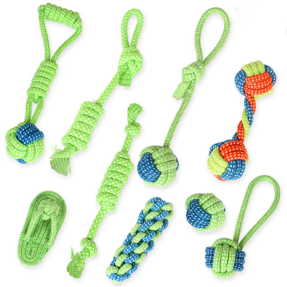 A collection of green and blue cotton rope dog toys for dental health and interactive play