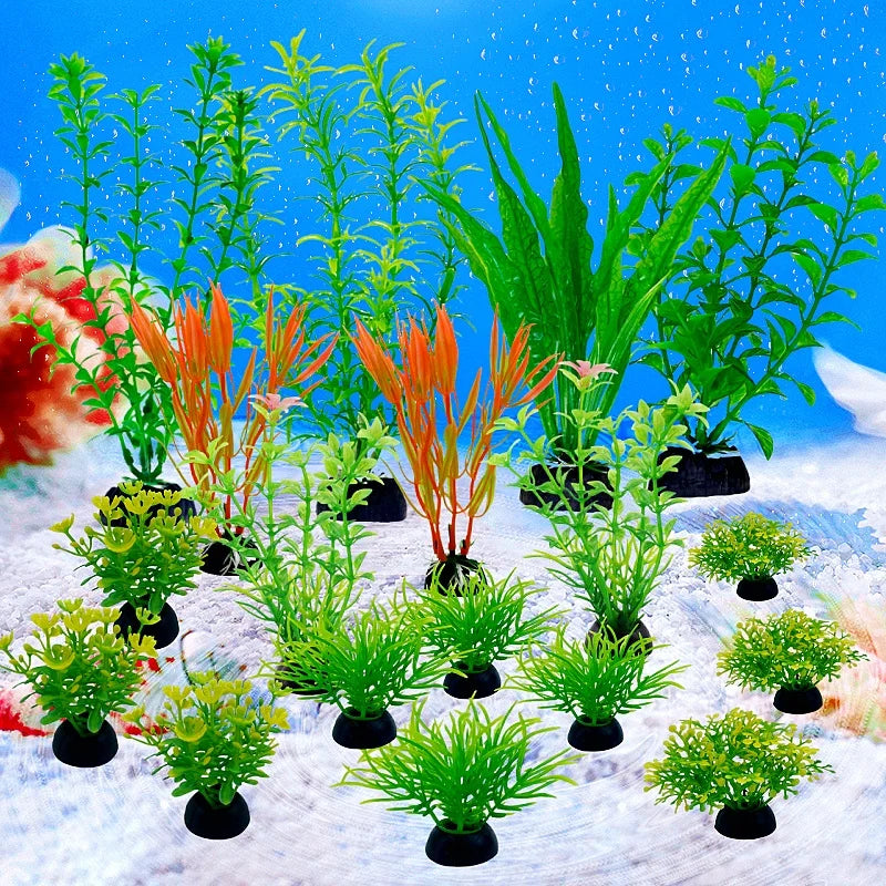 A collection of 18 artificial aquarium plants in various shades of green and orange displayed on a snowy surface.