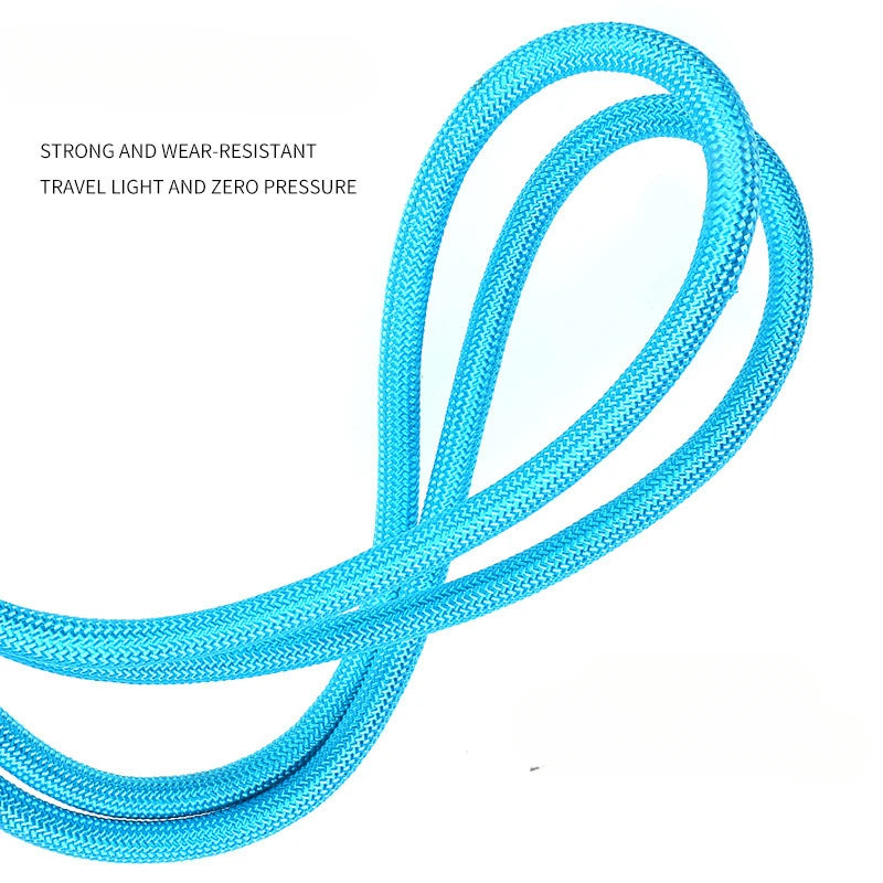 A bright blue, strong and wear-resistant adjustable hands-free dog leash coiled for travel.