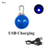 Blue rechargeable LED dog collar light with a silver clip and USB charging cable.