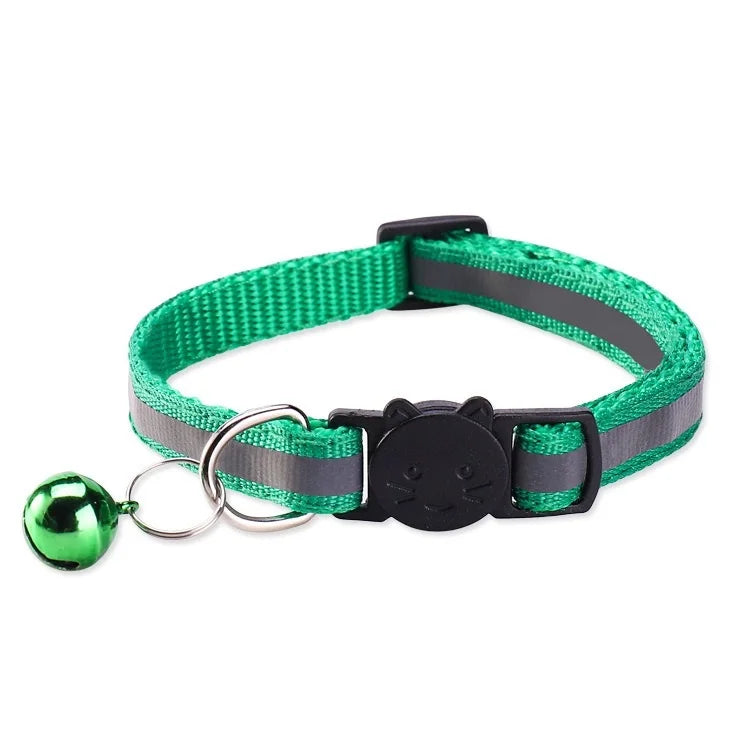 A green and black safety breakaway cat collar with a bell attached to a green and gray striped strap.