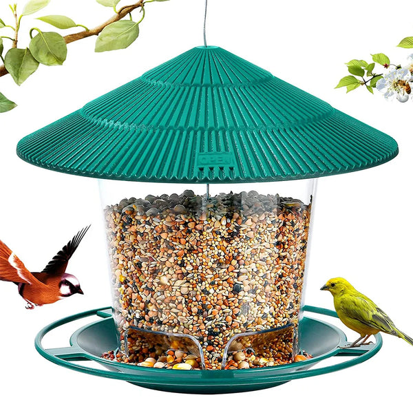 A green waterproof hanging bird seed feeder with a conical roof filled with seeds, mounted on a green tray.