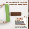A green cylindrical self-adhesive mount for a cat scratcher, shown next to a brown backing piece.