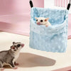 A light blue, textured hanging sleeping bag is shown with a small white pet resting inside, next to another small gray and wh