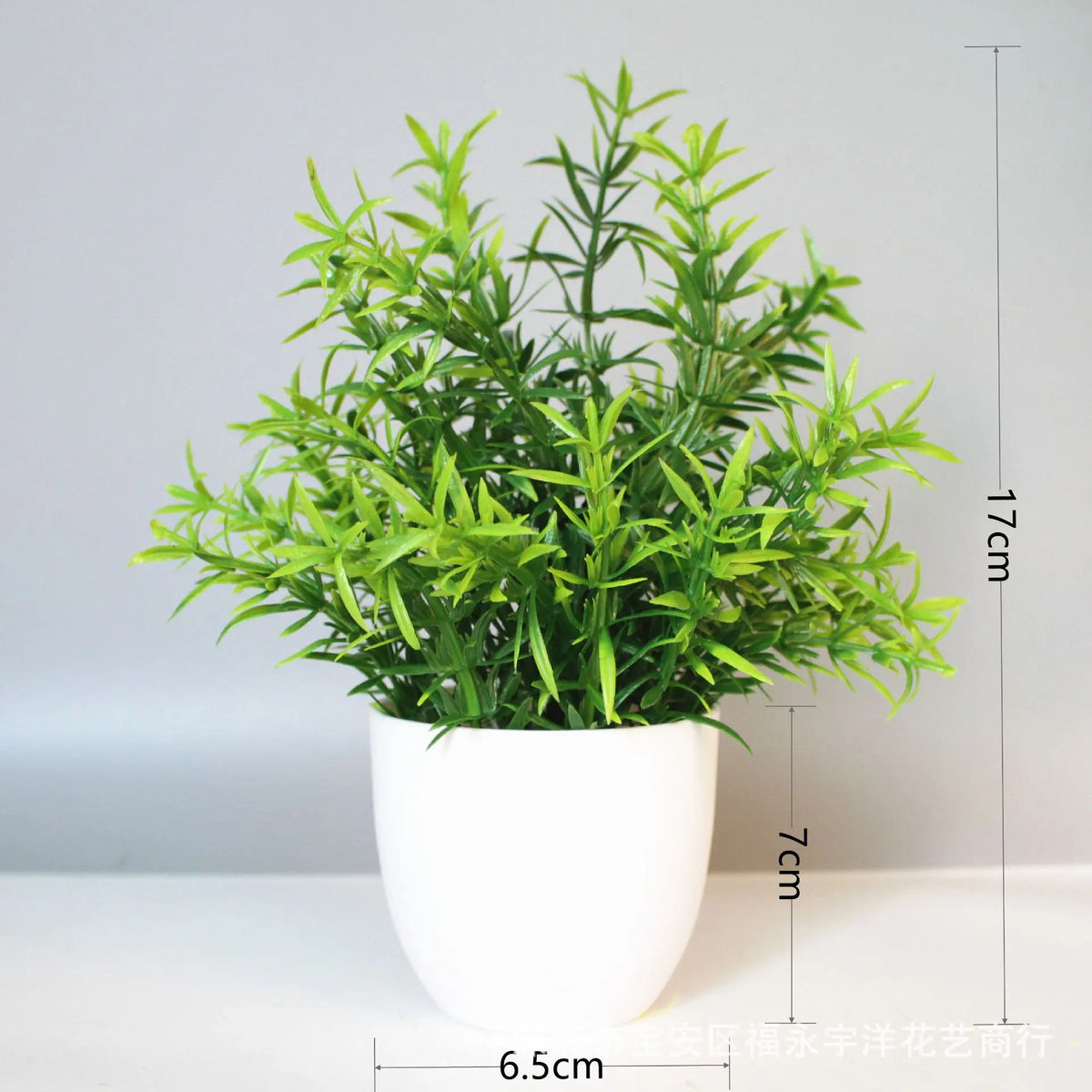 A vibrant green artificial bonsai plant in a white pot, shown with height measurements.