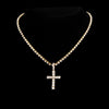 A dainty diamond Cuban link necklace set featuring a cross pendant displayed against a black background.