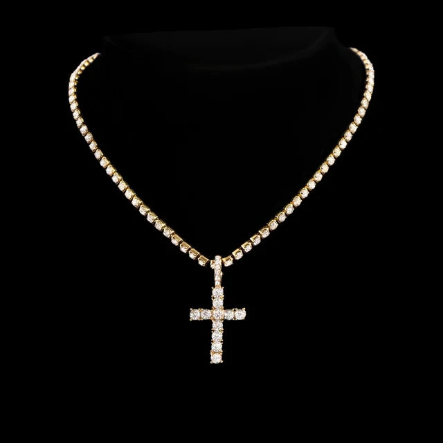 A dainty diamond Cuban link necklace set featuring a cross pendant displayed against a black background.