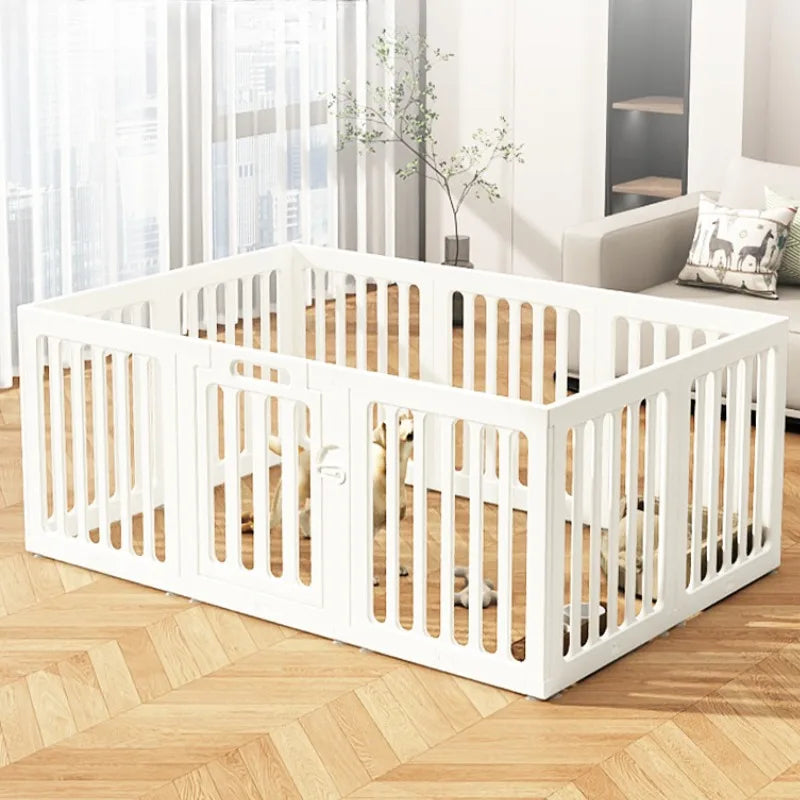 White indoor pet playpen with a wooden floor and vertical slats, shown in a modern living room setting.