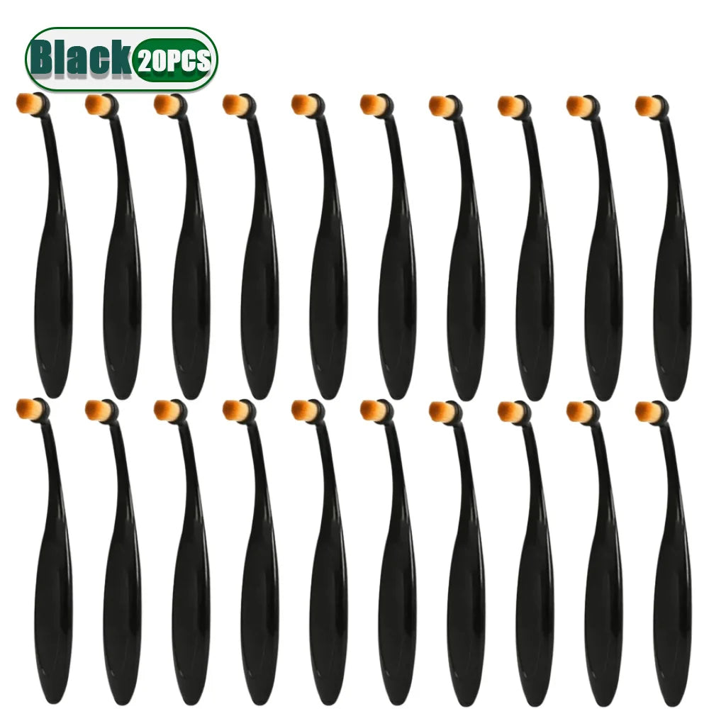 A set of black pet tear stain remover brushes for dogs and cats