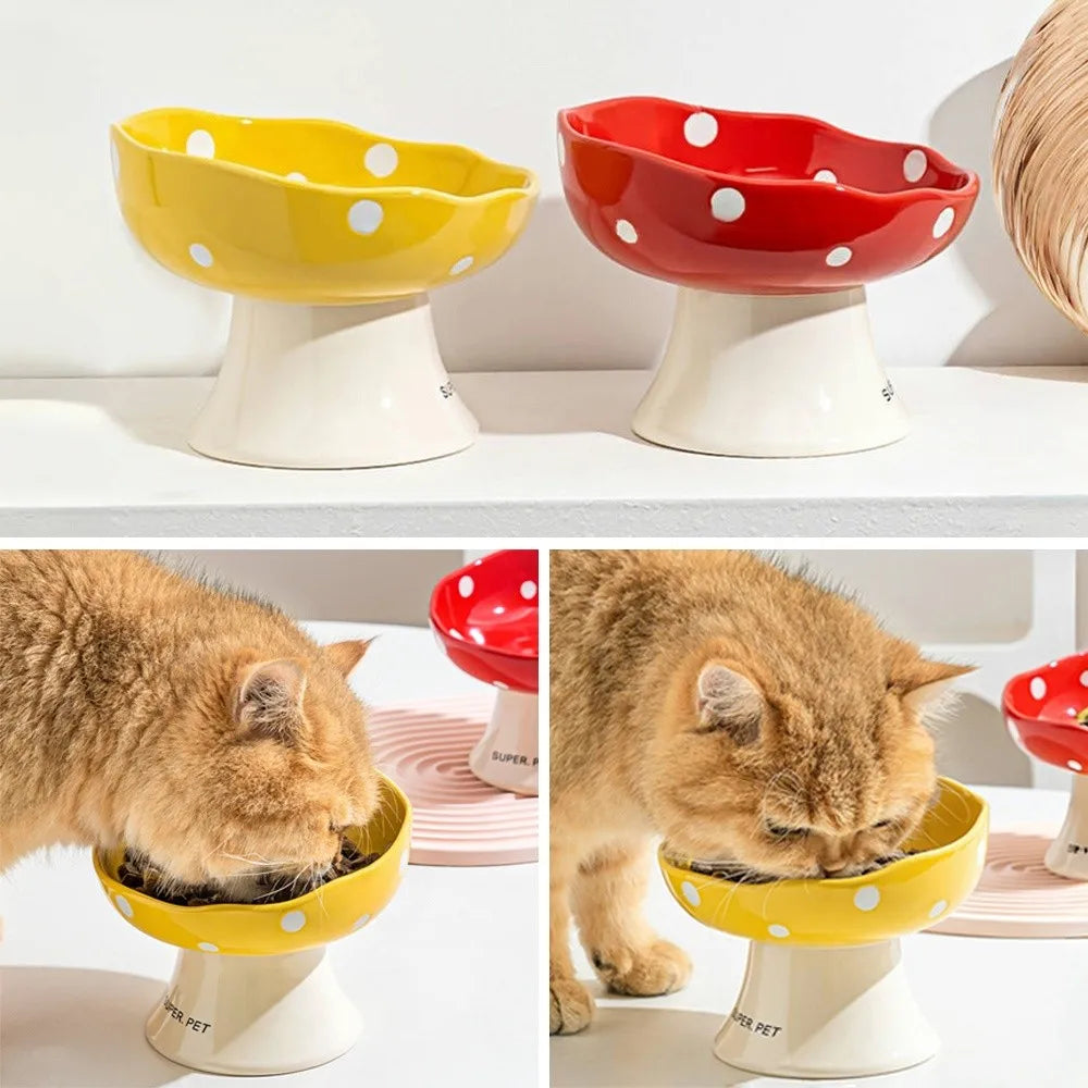 Three ceramic pet bowls in yellow and red with polka dots shown on a shelf.