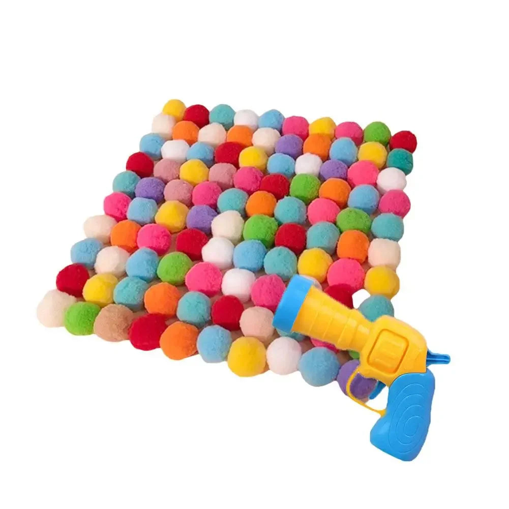 A colorful launcher toy filled with soft plush balls, designed for interactive play.