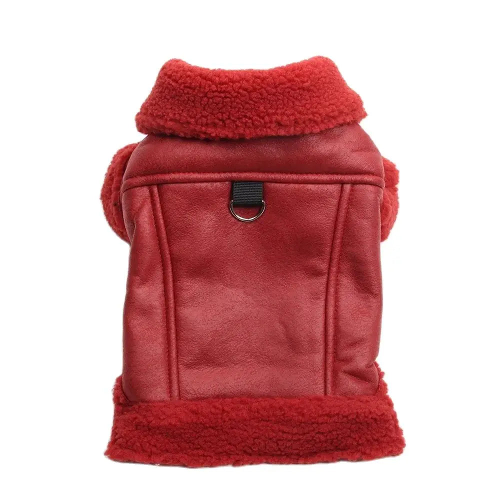 A maroon winter faux leather dog coat with a thick red fleece lining.