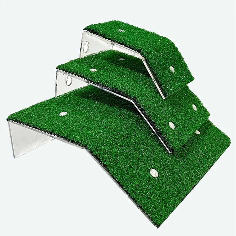 A green grass ramp platform with metal supports and suction cups for a turtle basking area.