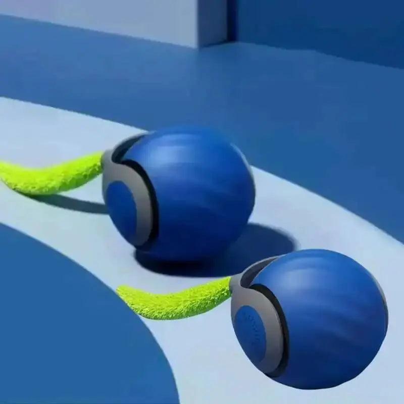 A blue interactive motion cat toy with a green faux tail is shown in a studio setting.