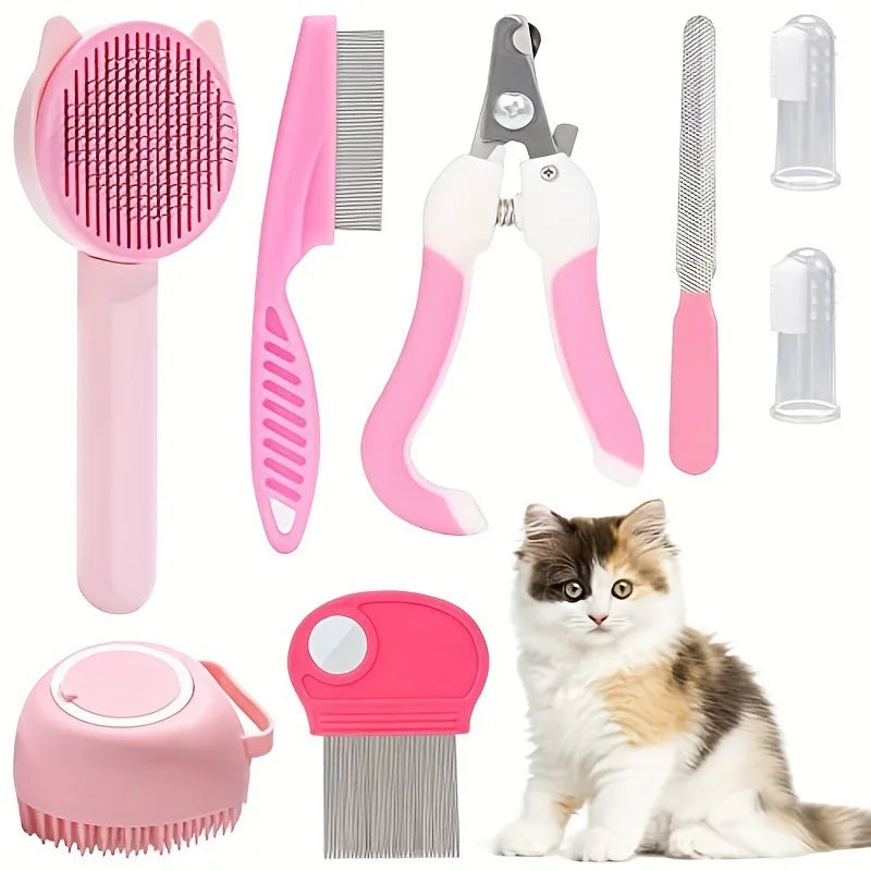 Rosa Haustierpflege-Set mit Bürste, Kämme und Nagelschere neben einer Katze.