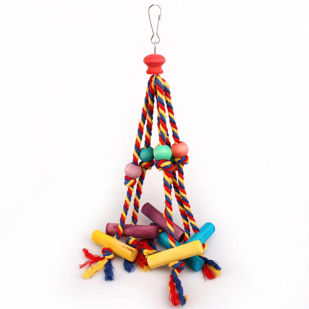 A natural wood and cotton rope parrot chewing toy with colorful knots and wooden pieces hanging from a metal hook.