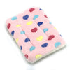 Pink plush fleece pet blanket with colorful heart-shaped appliqués for dogs and cats