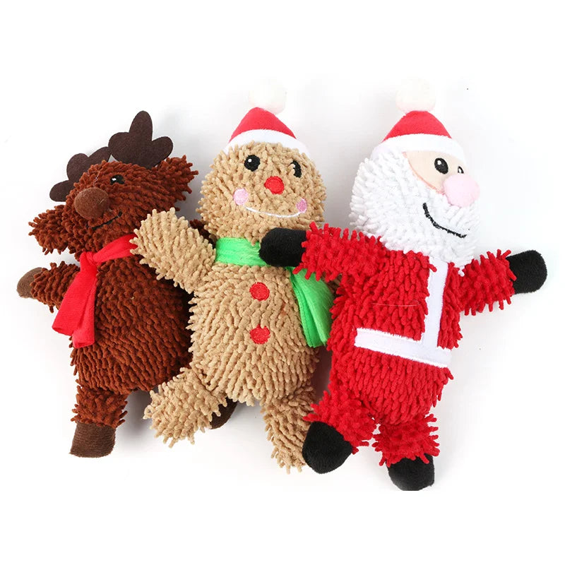 A collection of holiday plush toys including a Santa, an elk, a gingerbread man, and a donut design.