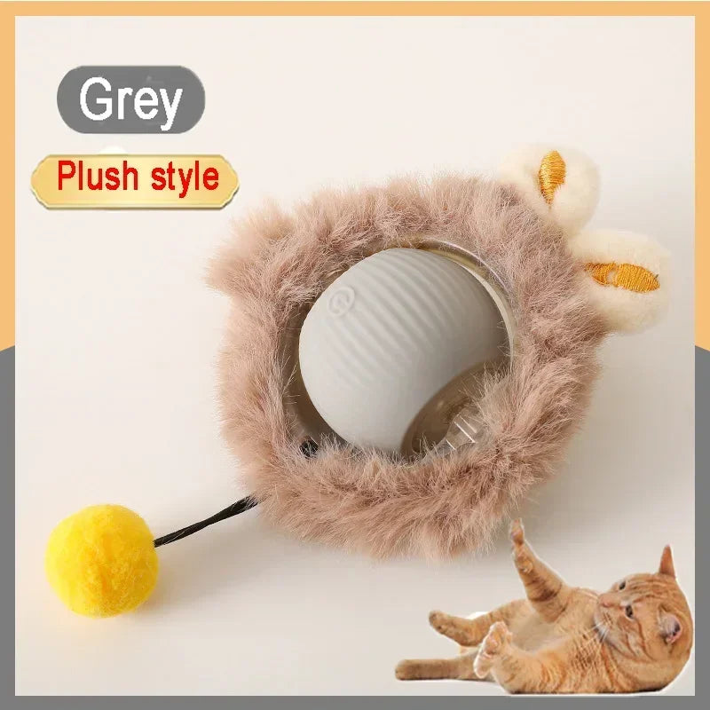 Grey plush style interactive prey-simulating pet toy ball with a yellow ball and a cat