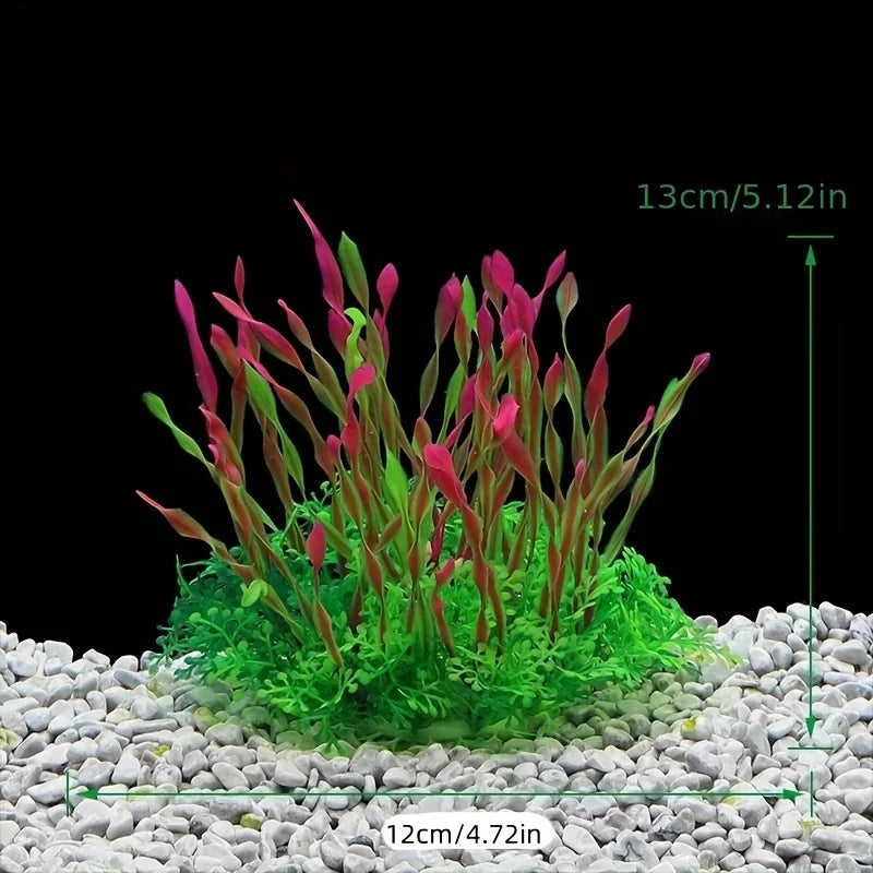 A set of four artificial aquarium plants with red and green leaves planted in white gravel.