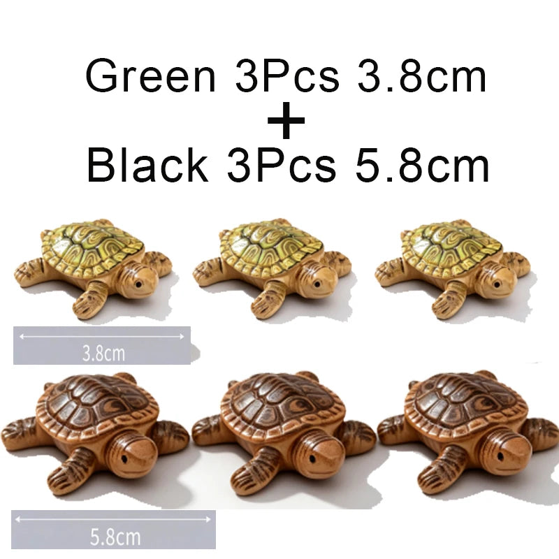 Green and black turtle floating ornaments set including three green pieces and three black pieces