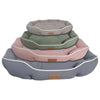 A stack of three luxurious corduroy pet sofa beds for dogs and cats in shades of gray, green, and pink.