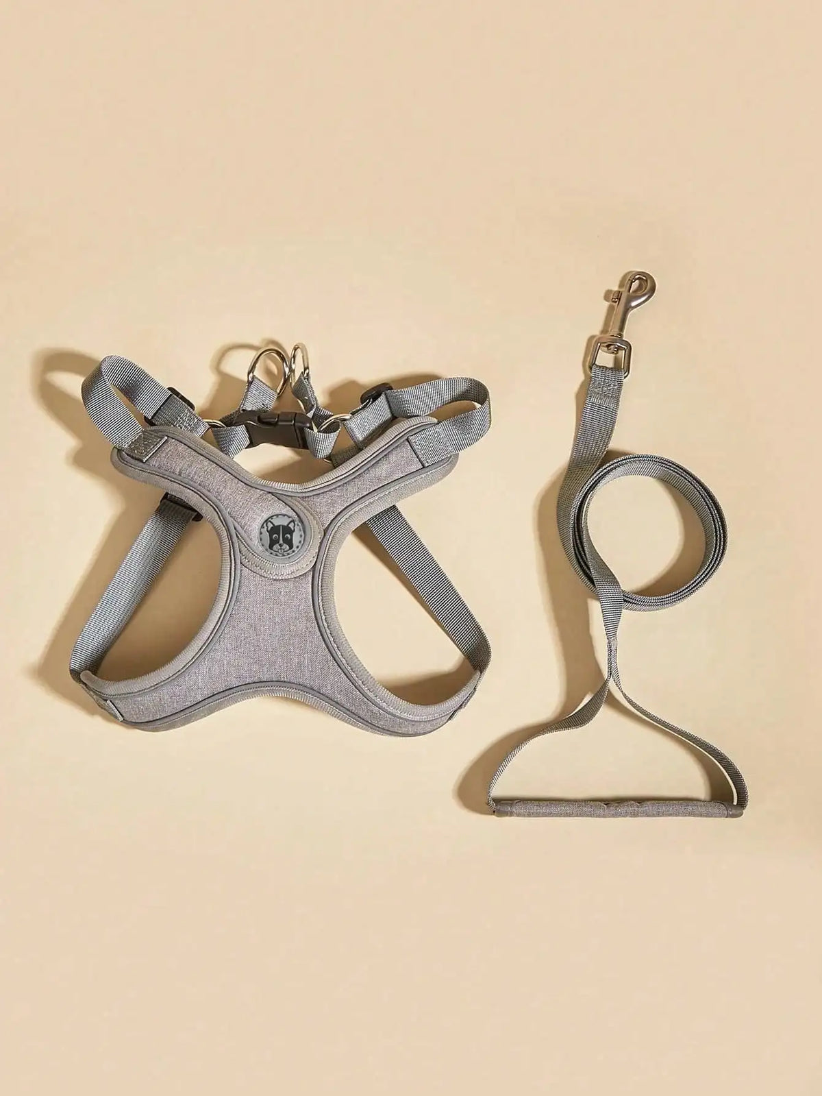 A gray comfort fit dog harness and leash set displayed against a light background.