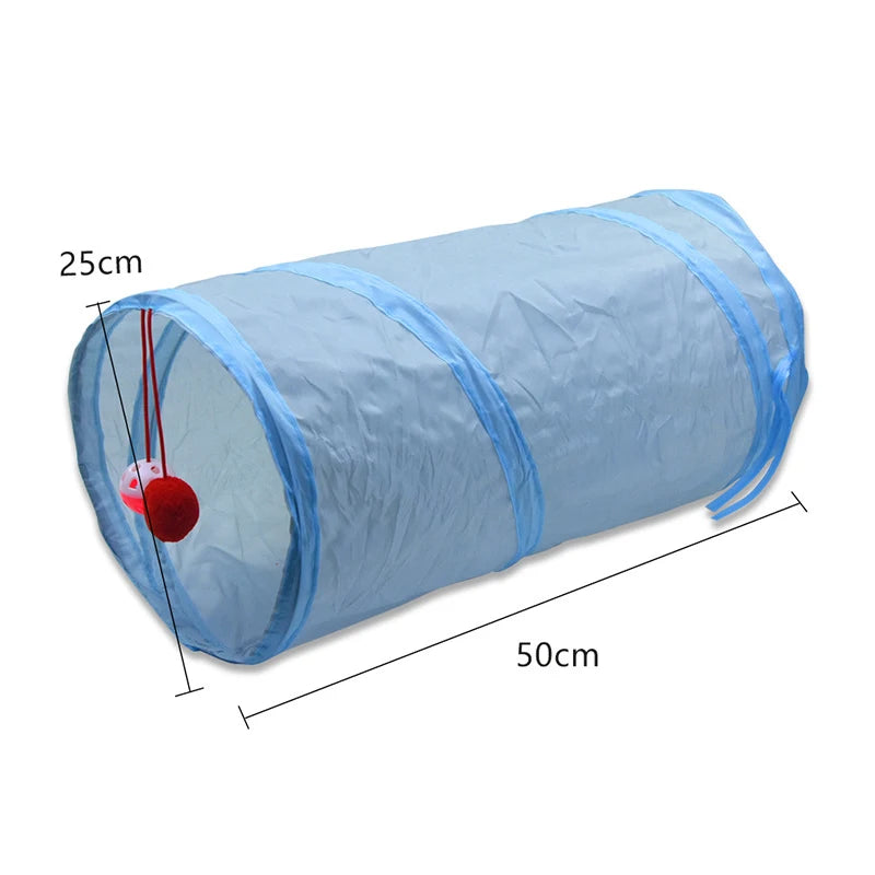A light blue foldable cat tunnel with a clear peep hole and a red hanging decoration.