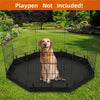 A golden retriever sits inside a black waterproof dog playpen mat on a green lawn.
