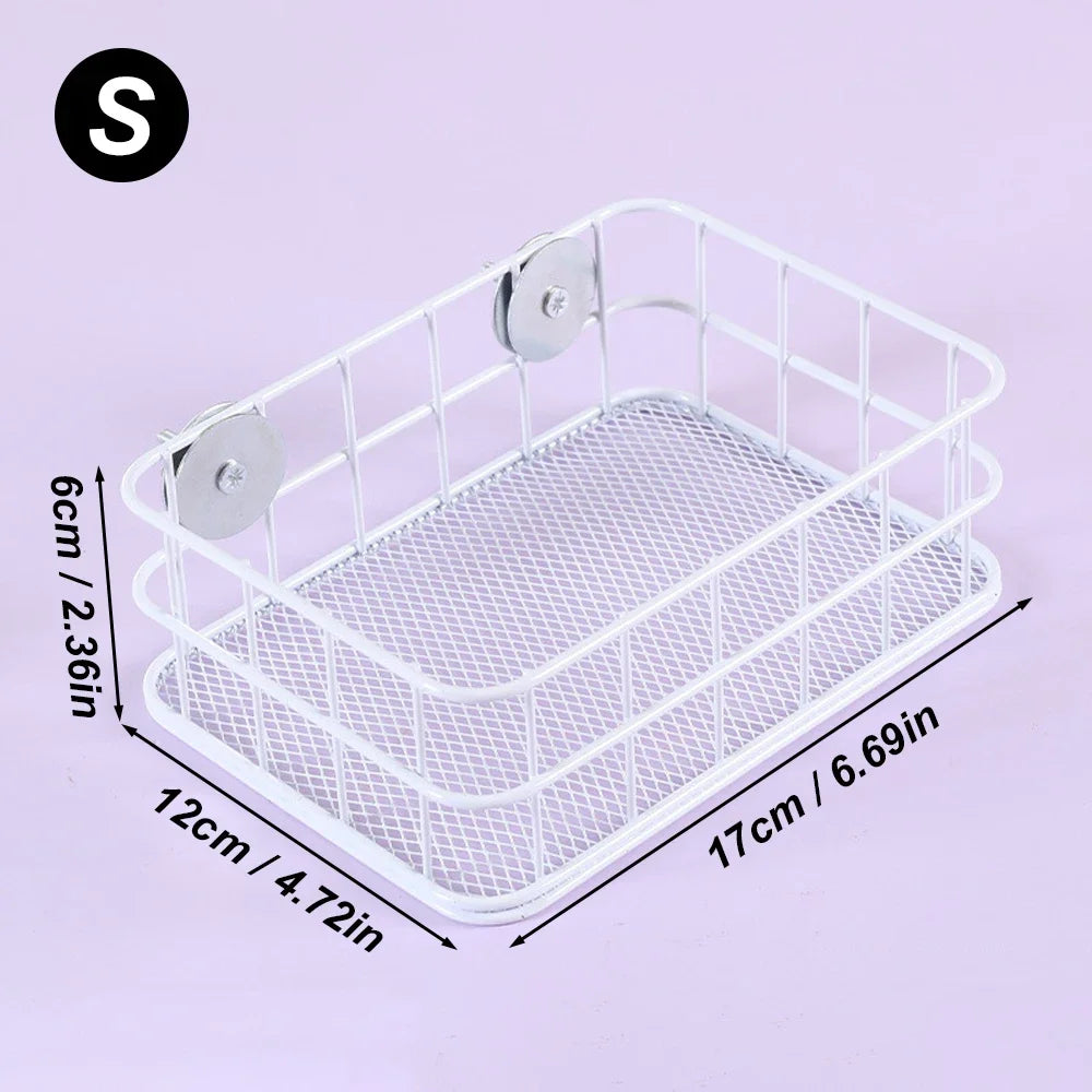 White mesh parrot nest bed with hanging wire and a small black letter S marker.