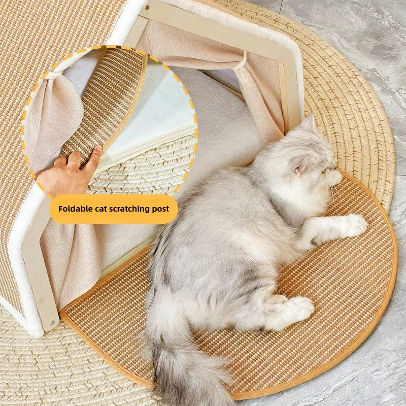 A fluffy gray cat is relaxing on a wooden cat scratching post with a semi-enclosed bed.