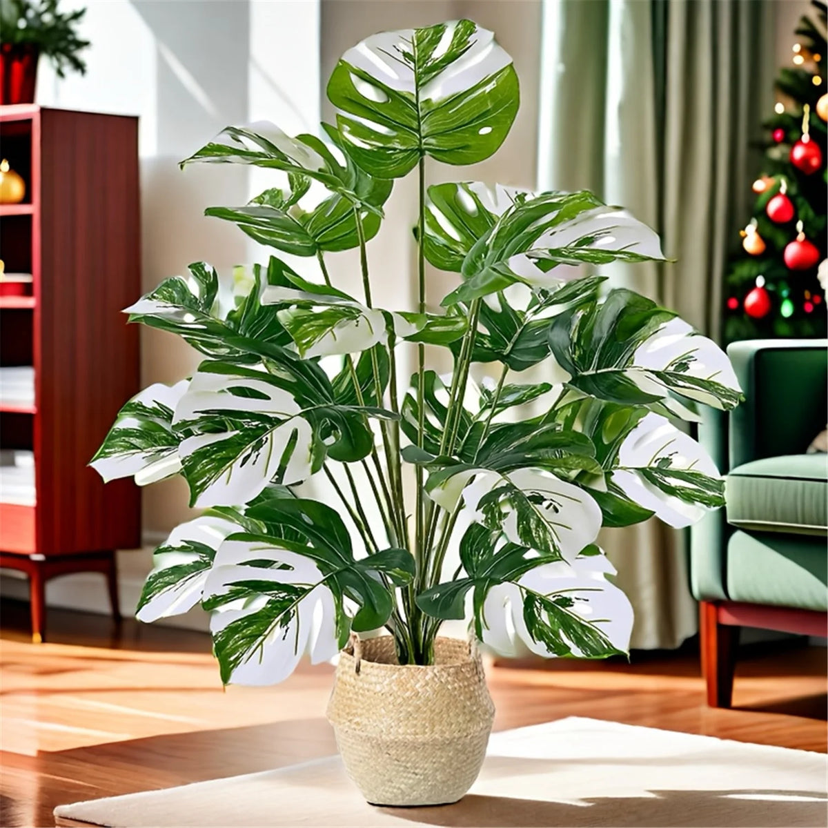 Artificial monstera plant with variegated green and white leaves potted in a woven basket