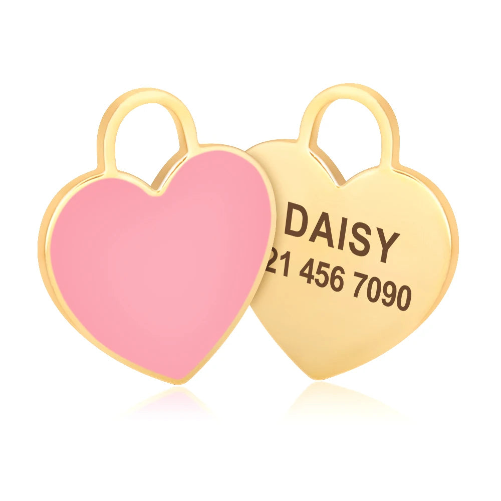 Gold heart-shaped pet ID tag with the name Daisy engraved on it.