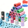 A stack of rolled biodegradable pet poop bags in various colors and sizes, including pink, purple, green, and silver.