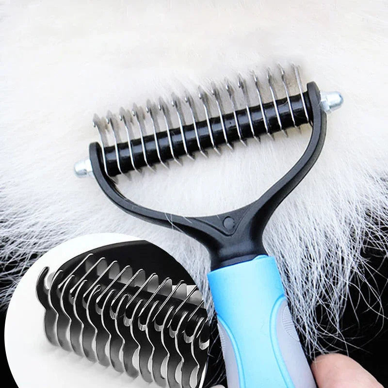 A black pet hair removal comb brush is shown against a white fluffy background.