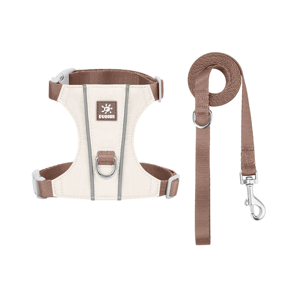 A beige escape-proof harness and leash set for cats and small dogs with reflective trim.