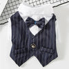A navy blue pinstripe vest with a bow tie and white shirt displayed on a hanger.