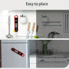 A digital meat thermometer is shown hanging on a hook and another magnetic version is shown on a refrigerator.