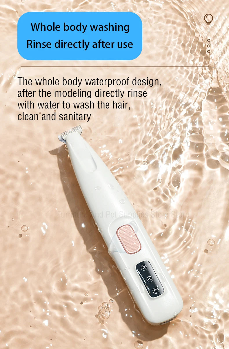 A white waterproof pet grooming trimmer is shown being rinsed under water.