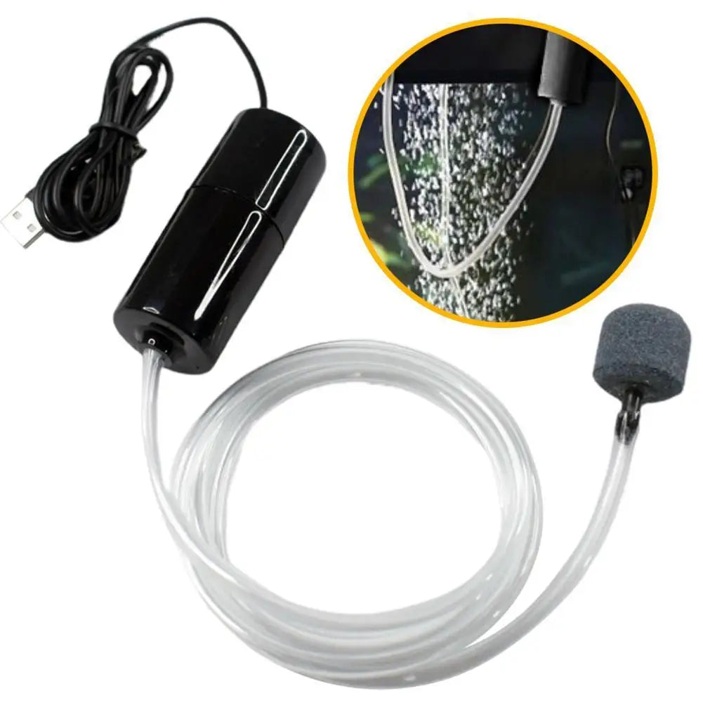 Pompe d'air pour aquarium USB noire avec pierre d'air et tuyau transparent, gros plan sur le flux d'air.