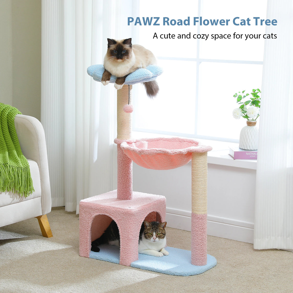 A pink and beige cat tree with a blue mat, featuring a cat resting on the top platform.