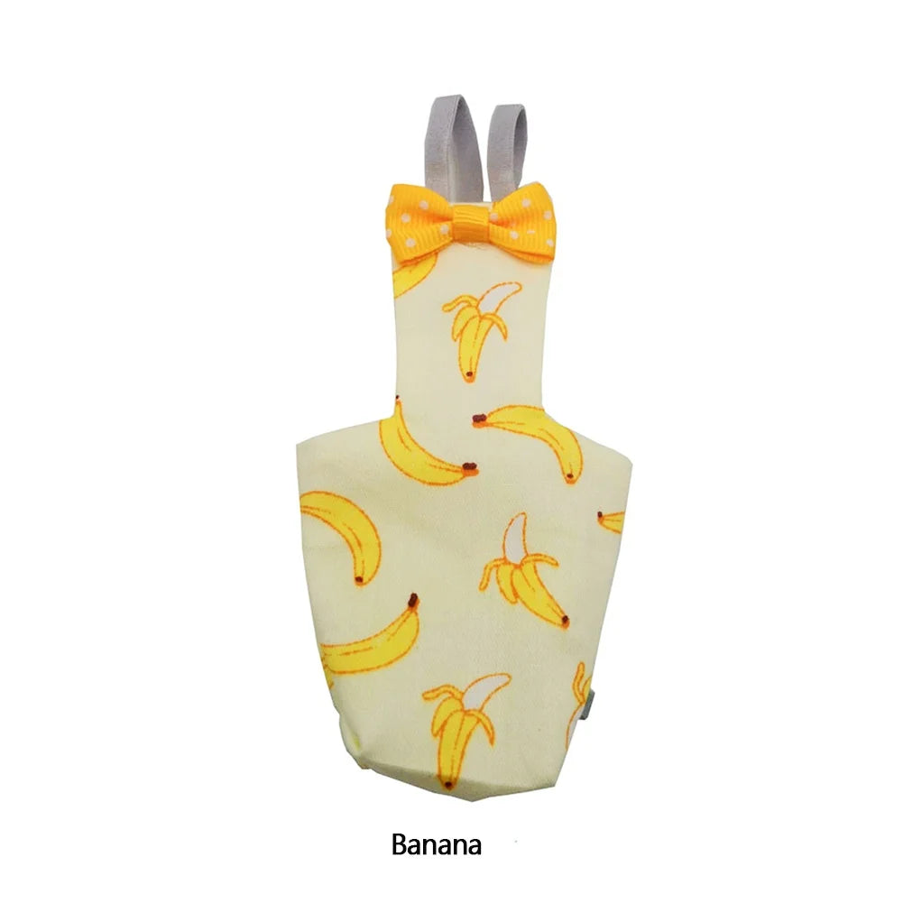 Gelber Papagei-Windelanzug mit Schleife und Bananenmuster.
