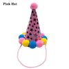Pink hat with a pom-pom and star pattern, designed as pet party headwear.